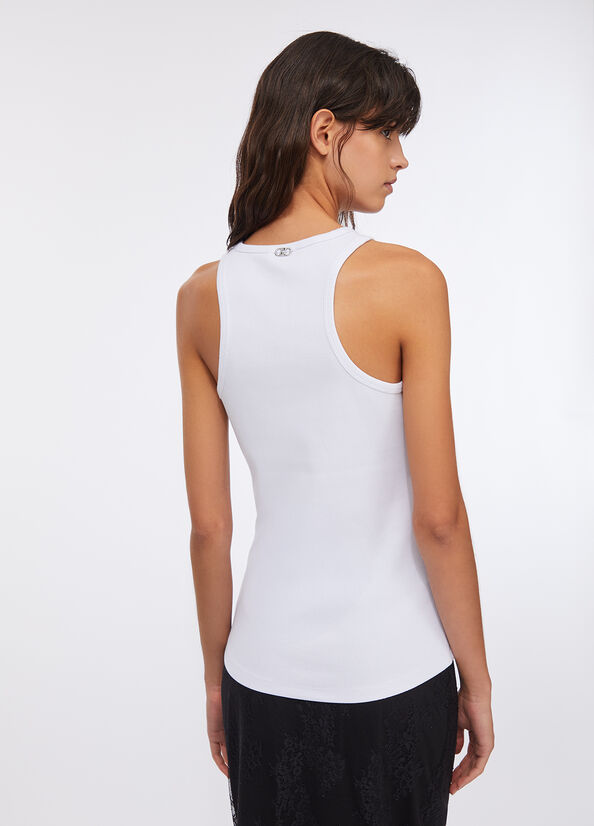 Top con applicazioni gioiello