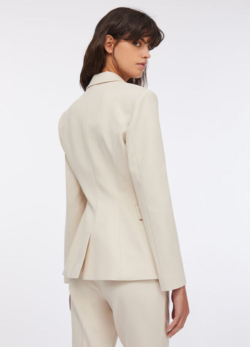 Blazer con spilla gioiello